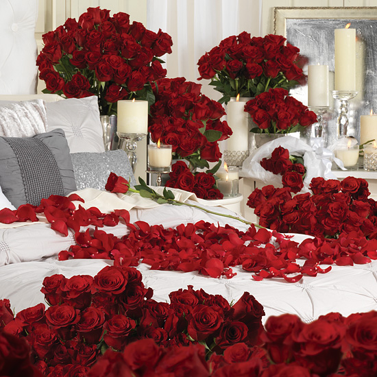 Two Dozen Red Roses with Red Vase by 1-800 Flowers